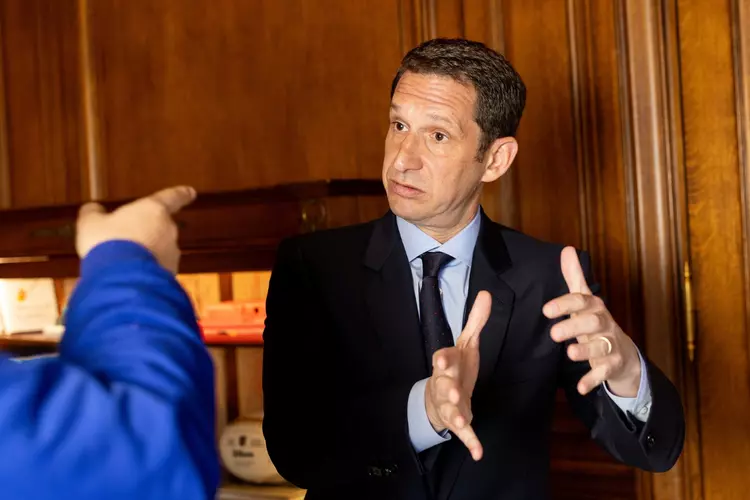 Mayor Daniel Lurie speaks to a reporter in his office at City Hall in San Francisco on April 8, 2025. Lurie has recently reached the milestone of 100 days in office.
