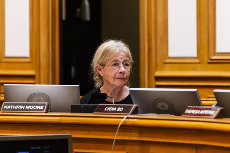 Kathrin Moore was told in 2012 that voting on projects involving an architecture firm she had worked at could be a conflict of interest.