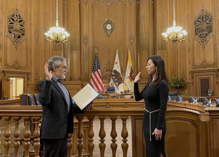 Supervisor Aaron Peskin swears in Kelly Wong to the San Francisco Elections Commission on Feb. 14.