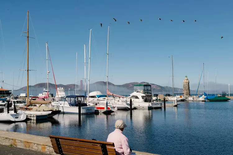 A person looks out at the San Francisco Marina in October 2023.
