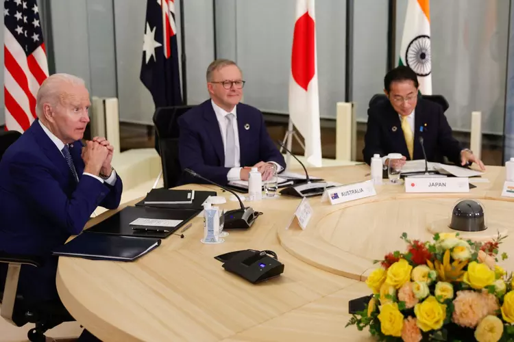 U.S. President Joe Biden, left; Australia’s Prime Minister Anthony Albanese, center; and Japan’s Prime Minister Fumio Kishida, right, hold a meeting on the G7 Leaders’ Summit in Hiroshima, Japan, on May 20, 2023. | Jonathan Ernst/AFP/Pool