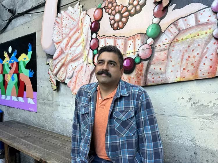 Stephen Torres, shown here on the patio at San Francisco bar El Rio, will enter the 2024 race for District 9 supervisor.